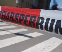Symbolfoto von 5min.at: Nahaufnahme von einem Absperrband der Polizei.