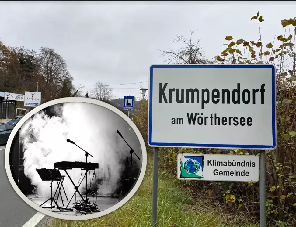 Das Bild auf 5min.at zeigt Krumpendorf und eine Konzertbühne.