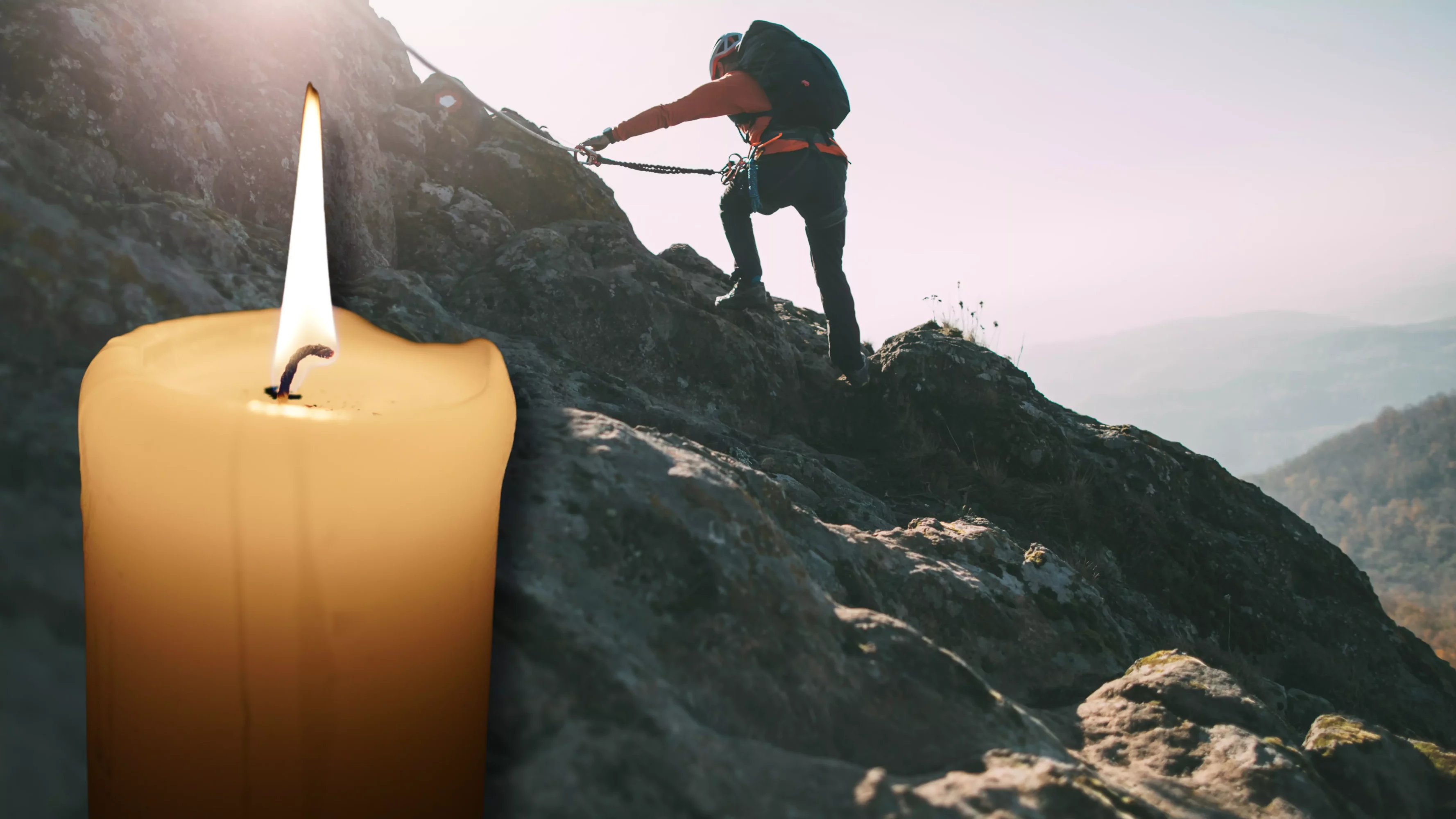 Das Bild auf 5min.at zeigt einen Kletterer und eine Kerze