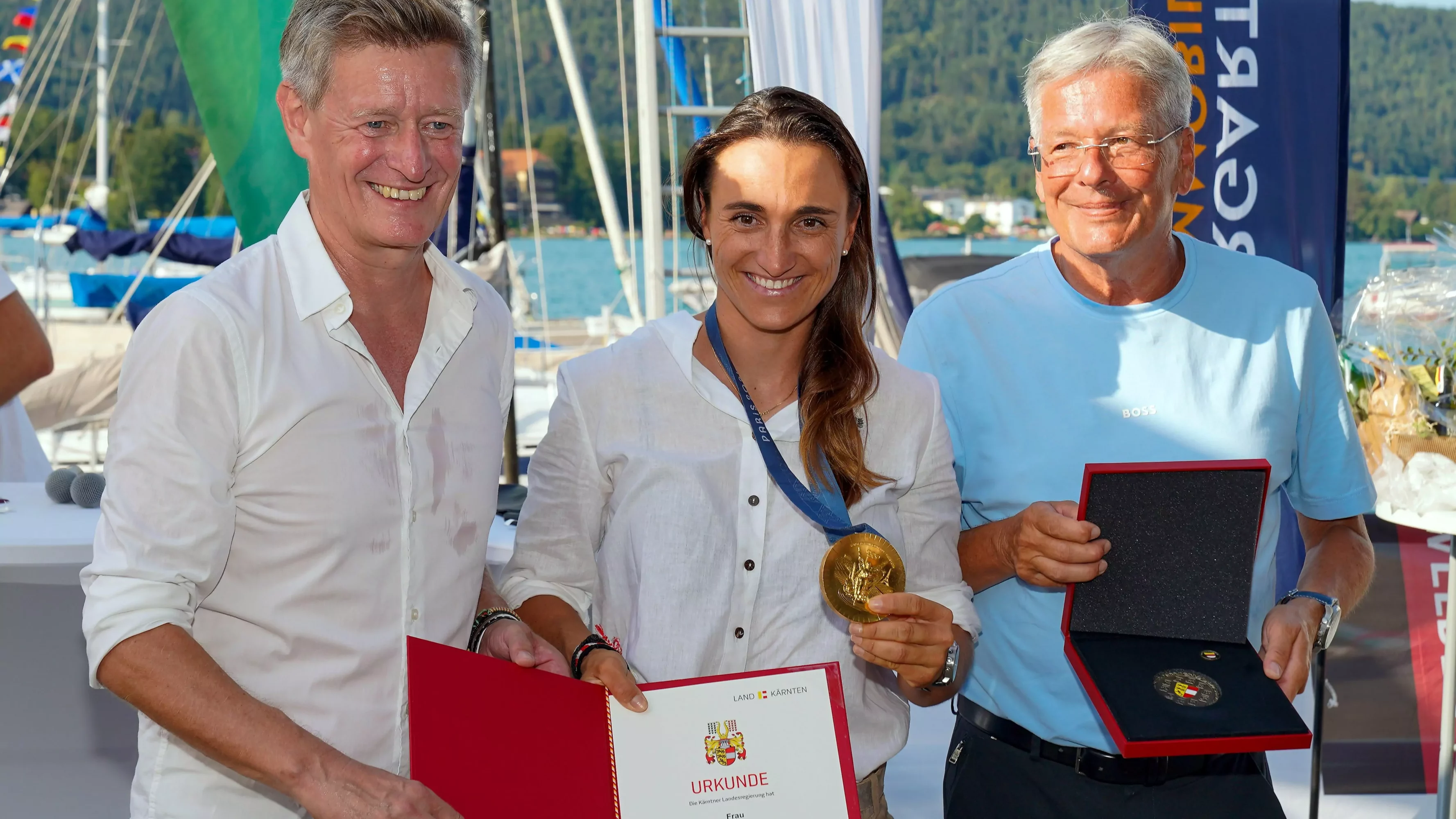 Bild auf 5min.at zeigt Landesportdirektor Arno Arthofer, Lara Vadlau und LH Peter Kaiser