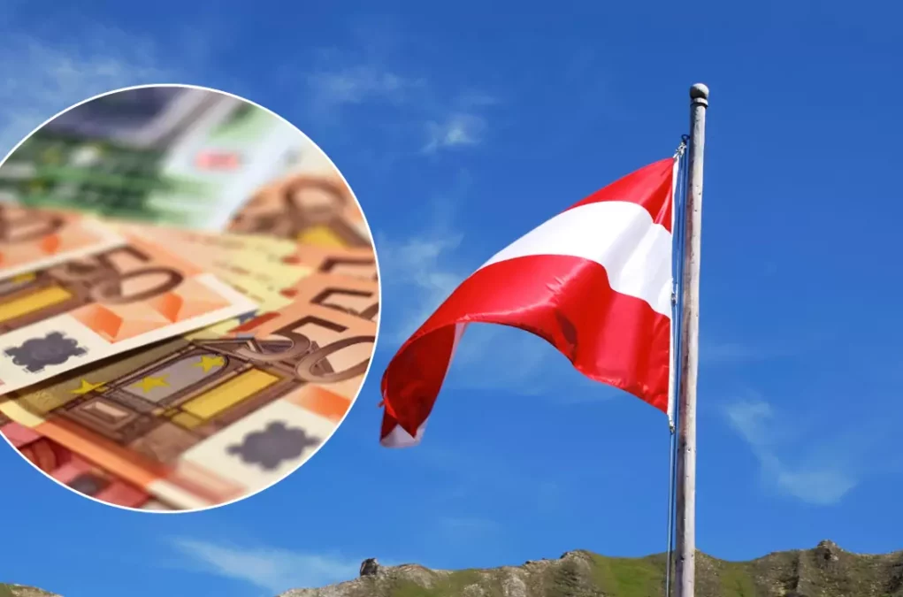 Bild auf 5min.at zeigt eine Österreich-Flagge und Geldscheine.