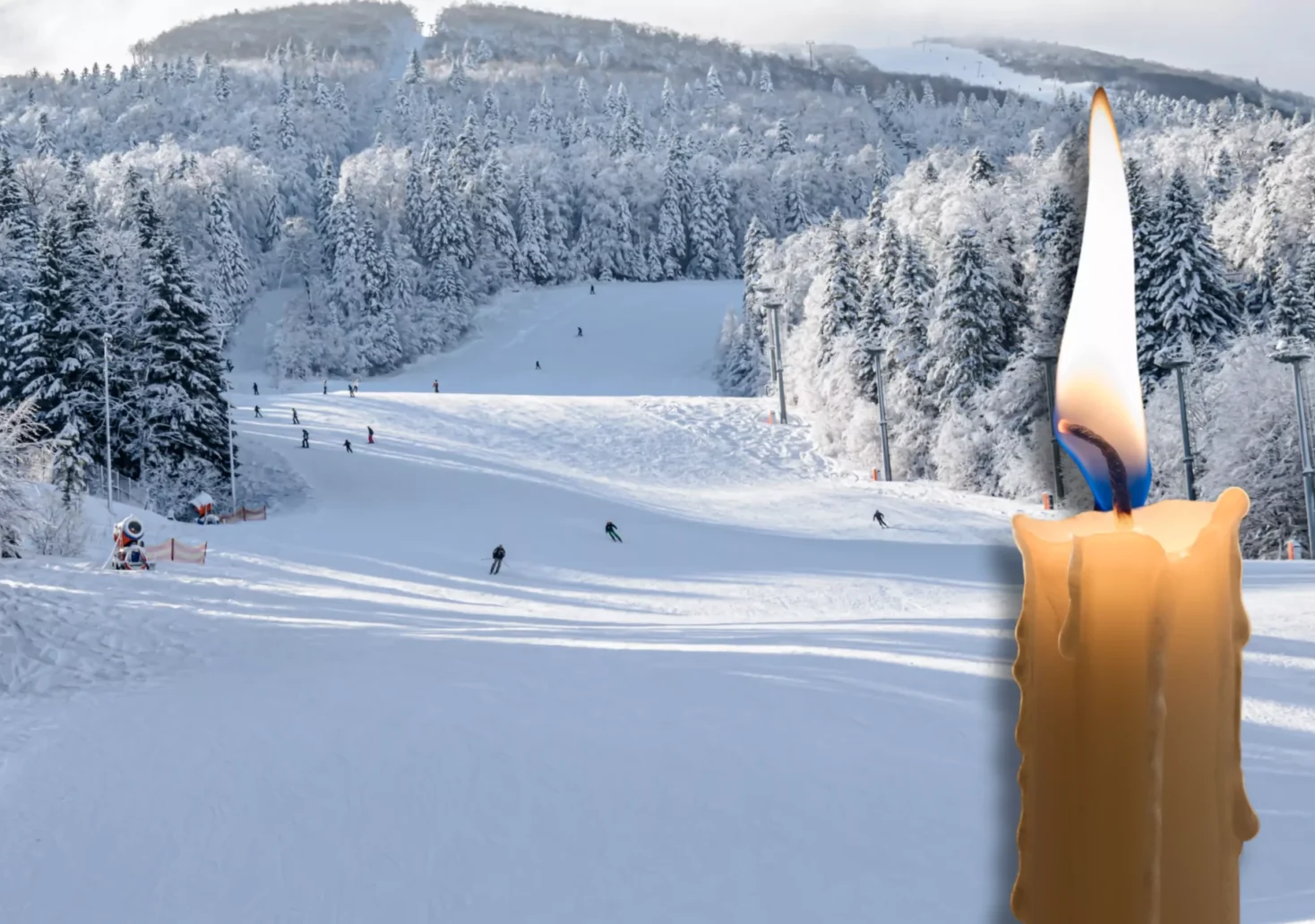 Ein Bild auf 5min.at zeigt eine Skipiste und eine Kerze