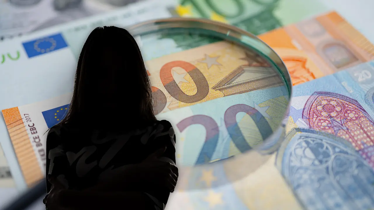 Bild auf 5min.at zeigt Geldscheine und die Silhouette einer Frau.