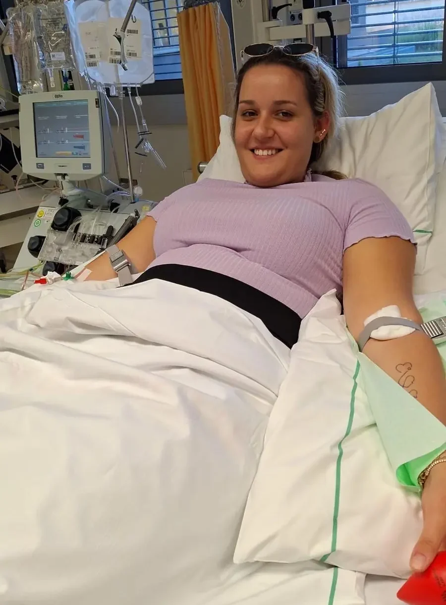 Foto auf 5min.at zeigt eine Person in die Kamera l&auml;cheln