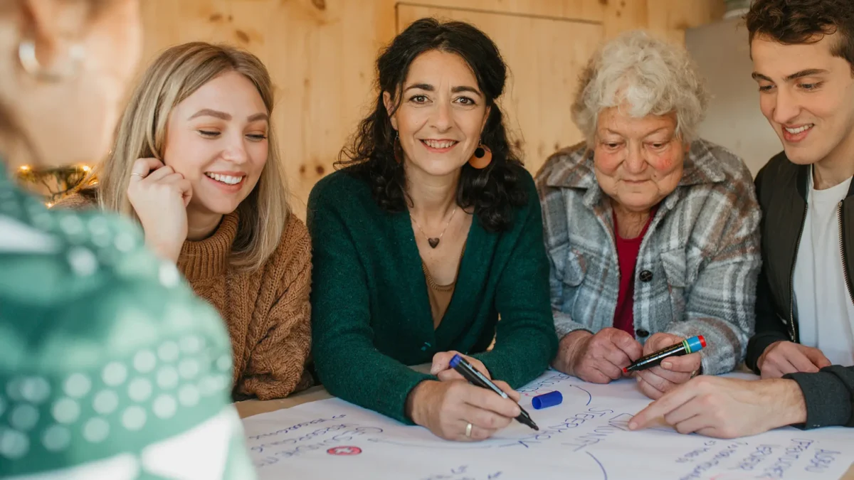 Das Bild auf 5min.at zeigt 3 Generationen nebeneinander sitzend.