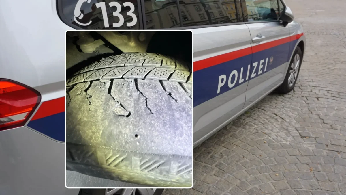 Foto in Beitrag von 5min.at zeigt ein Polizeiauto und einen Reifen im Vordergrund.