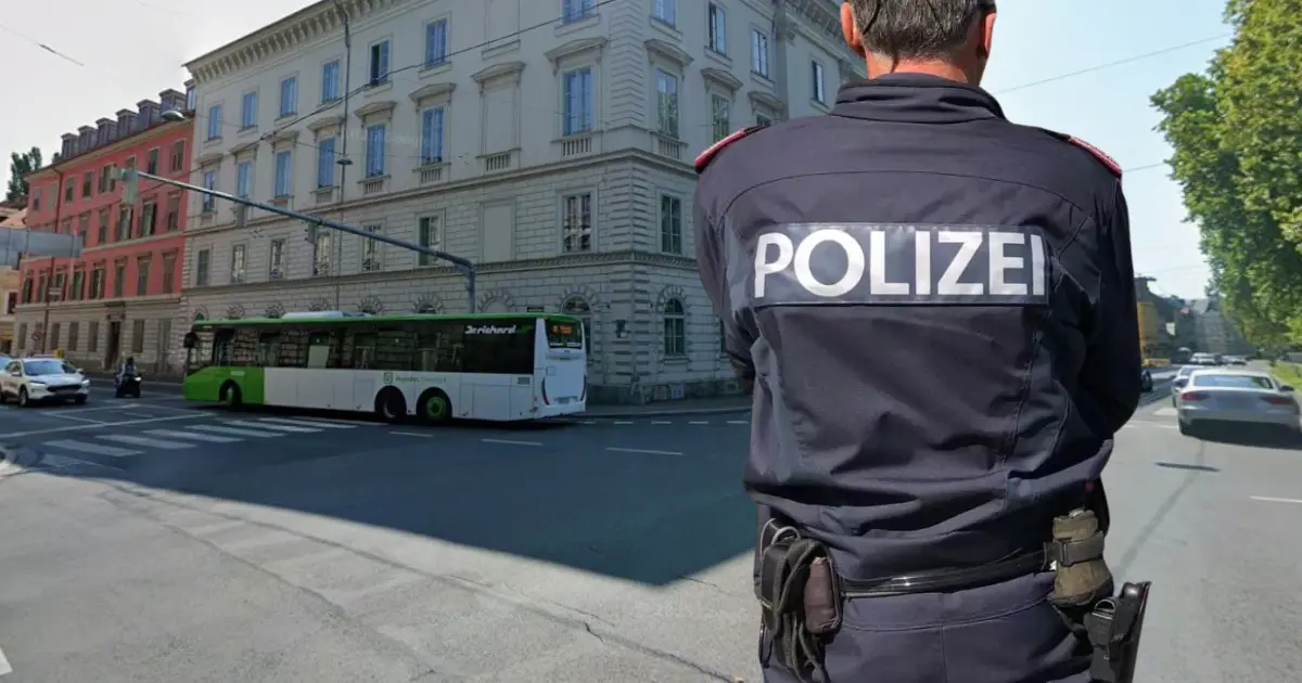 Bild auf 5min.at zeigt einen Polizisten vor einer Straße.